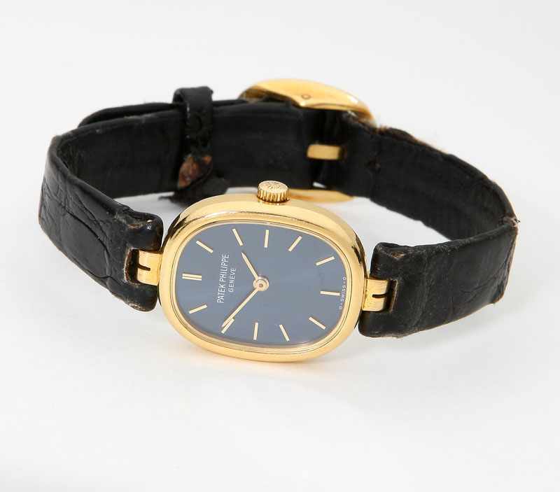 Appraisal: Ellipse'' slate blue dial with gold tone baton markers signed