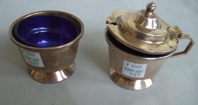 Appraisal: A silver mustard pot and a silver salt each of