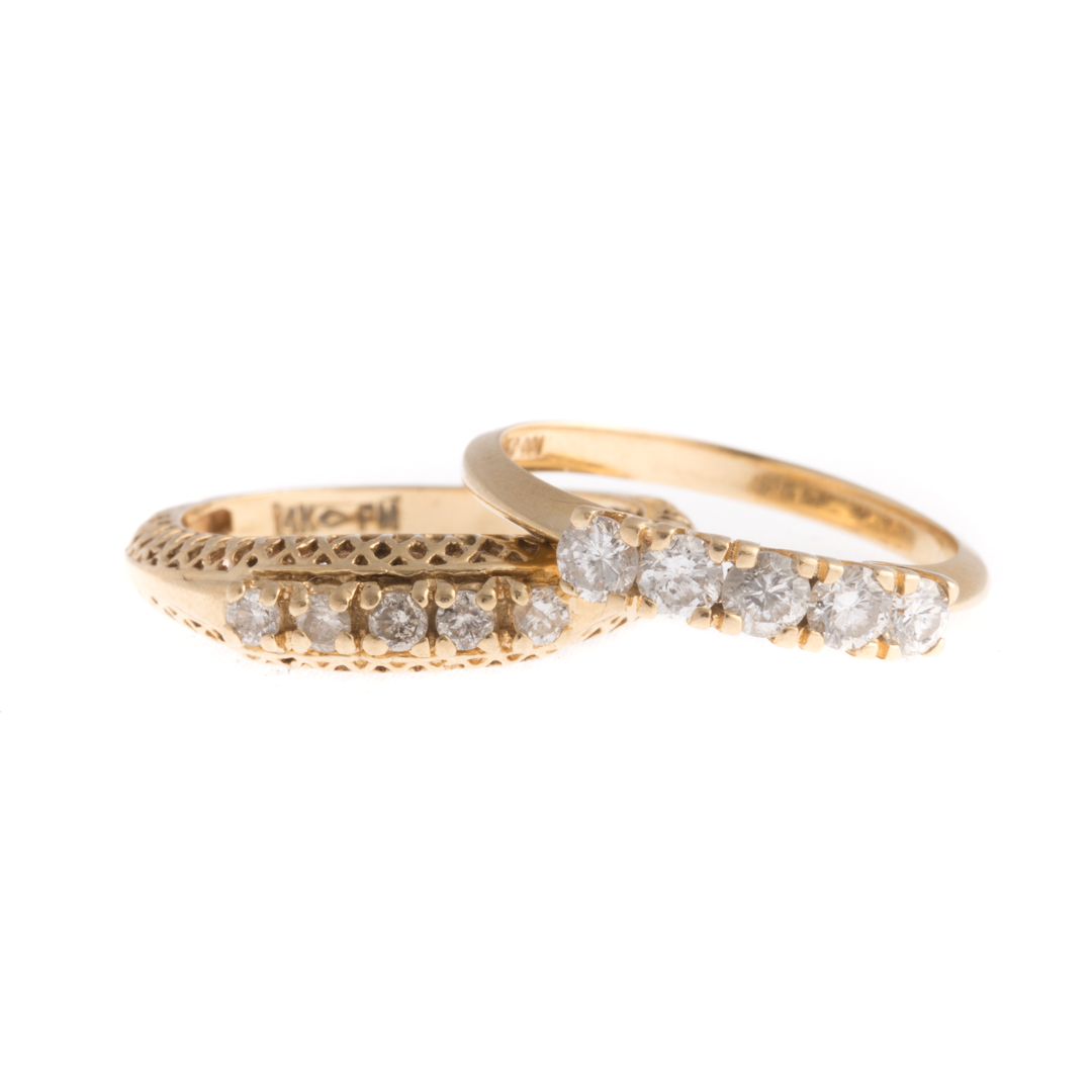 Appraisal: A Pair of Gold Diamond Bands K yellow gold diamond