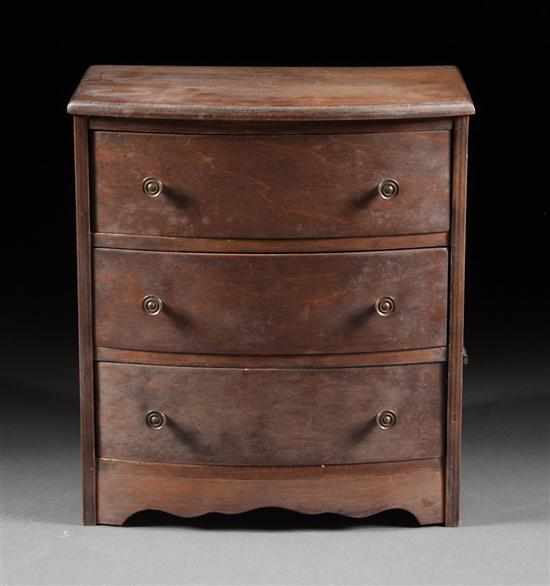 Appraisal: Federal style stained wood miniature bow-front three-drawer chest three graduated