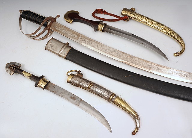 Appraisal: A INDIAN TULWAR and two Indian daggers