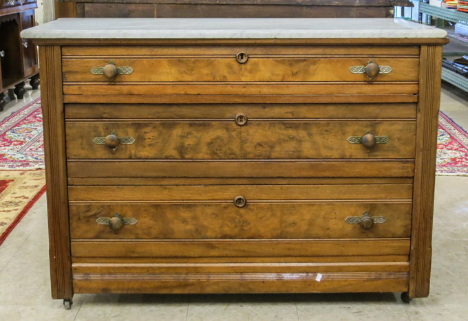 Appraisal: A VICTORIAN WALNUT CHEST OF DRAWERS Eastlake style American c