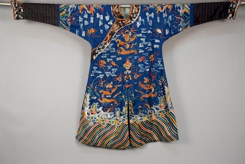 Appraisal: CHINESE SILK EMBROIDERED DRAGON ROBE EARLY th C Blue silk