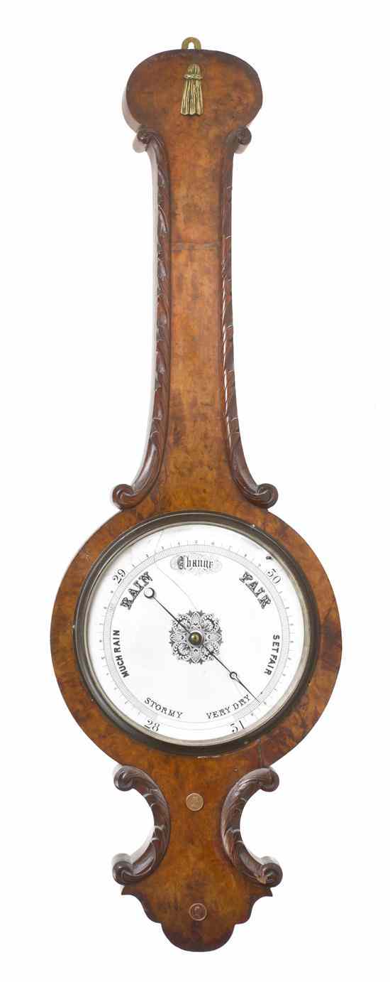 Appraisal: An English Burlwood Wheel Barometer having a foliate carved stem