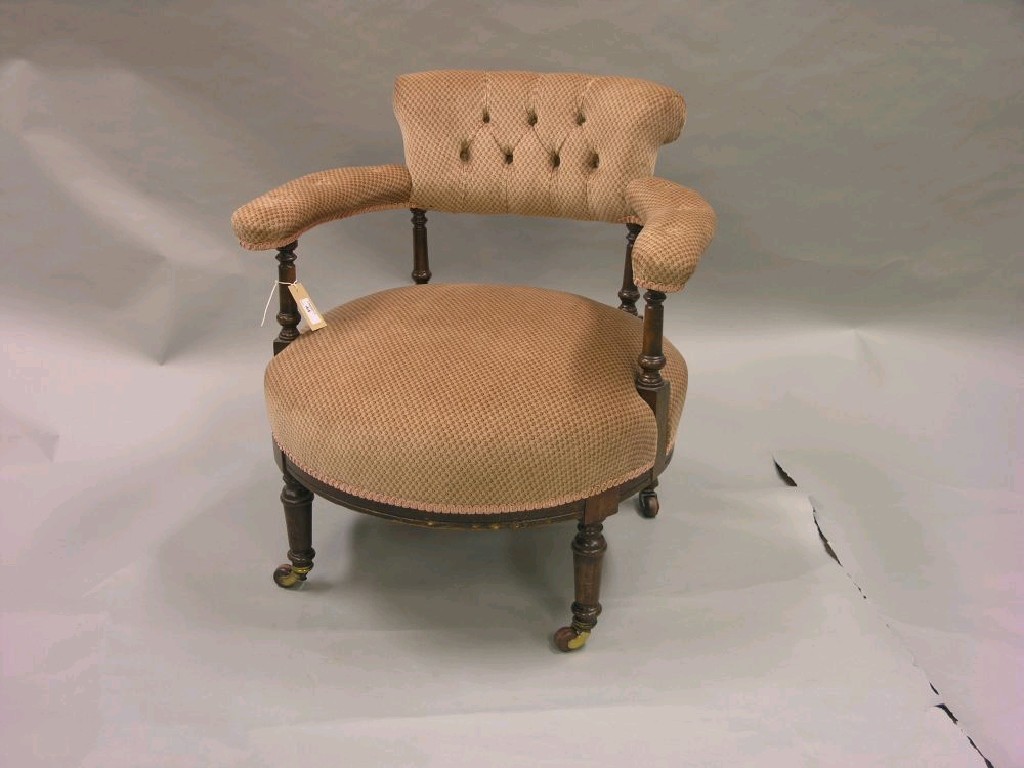 Appraisal: A Victorian drawing room tub chair turned walnut frame buttoned