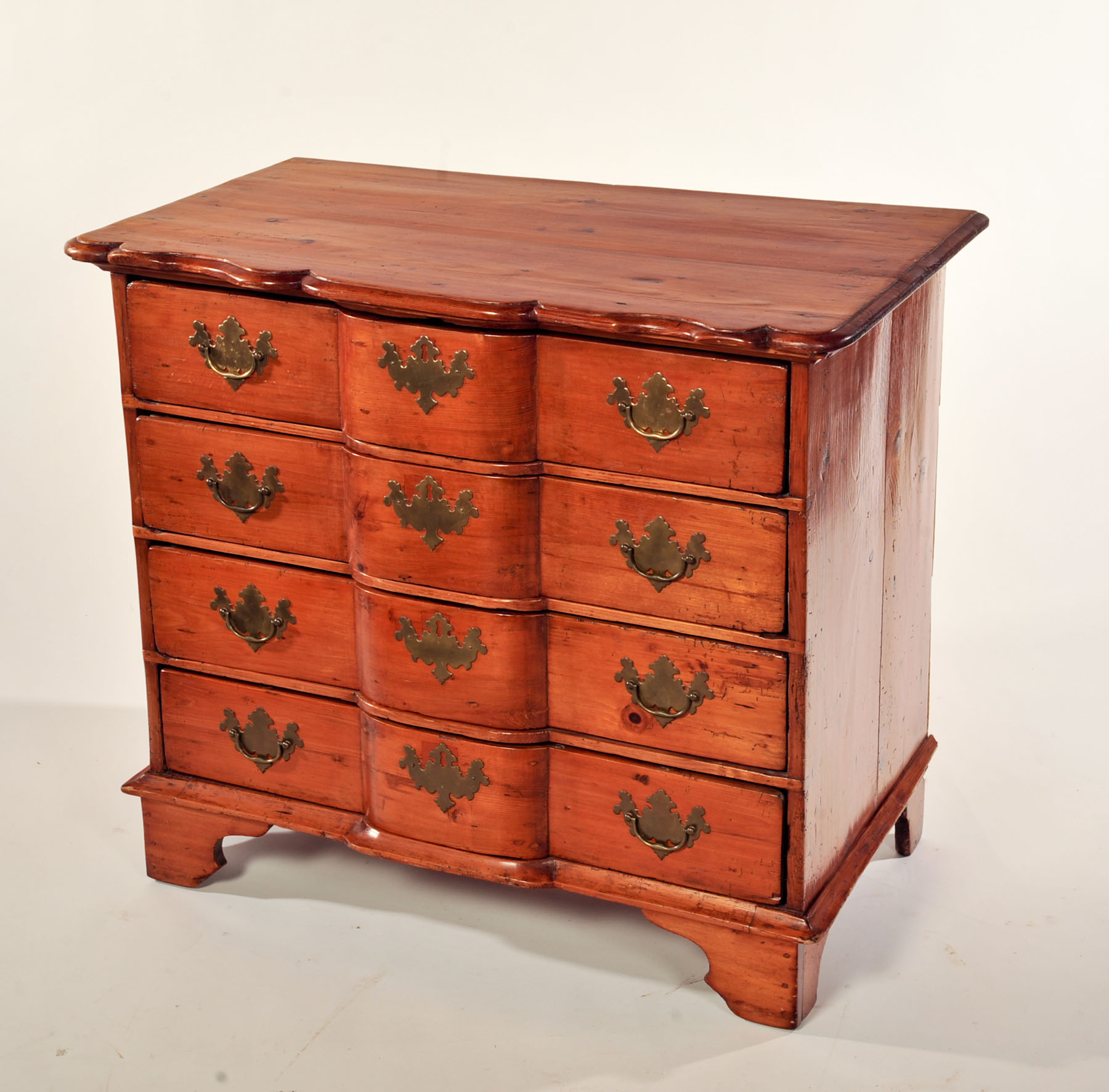 Appraisal: QUEEN ANNE-STYLE FOUR-DRAWER CHEST England th century pine Assembled from