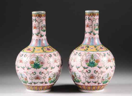 Appraisal: PAIR CHINESE FAMILLE ROSE PORCELAIN BOTTLE VASES Qianlong iron red