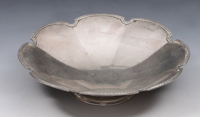 Appraisal: A SILVER TAZZA with shaped sides and eight panels with