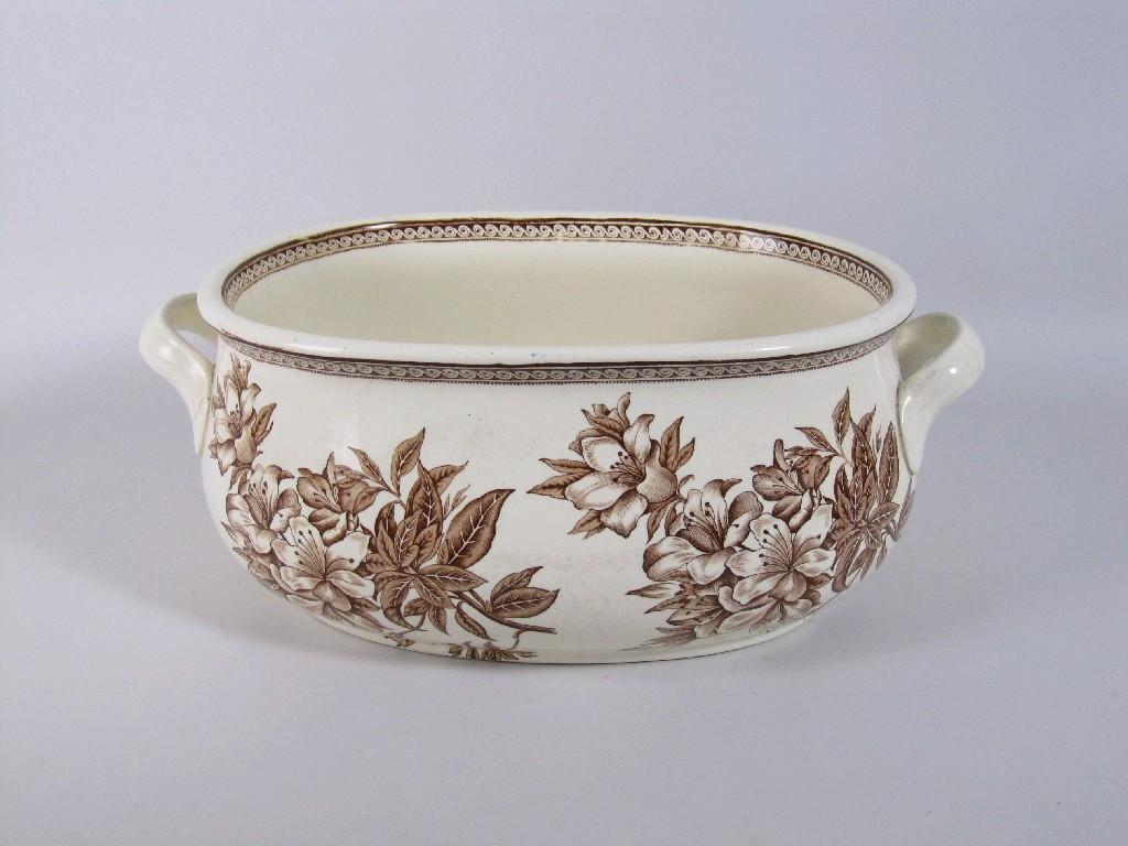 Appraisal: An S W M Co pottery two handled Footbath sepia