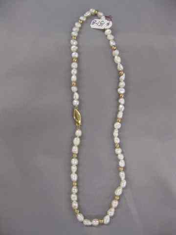 Appraisal: k Gold Pearl Necklace freshwater pearls with gold beads and