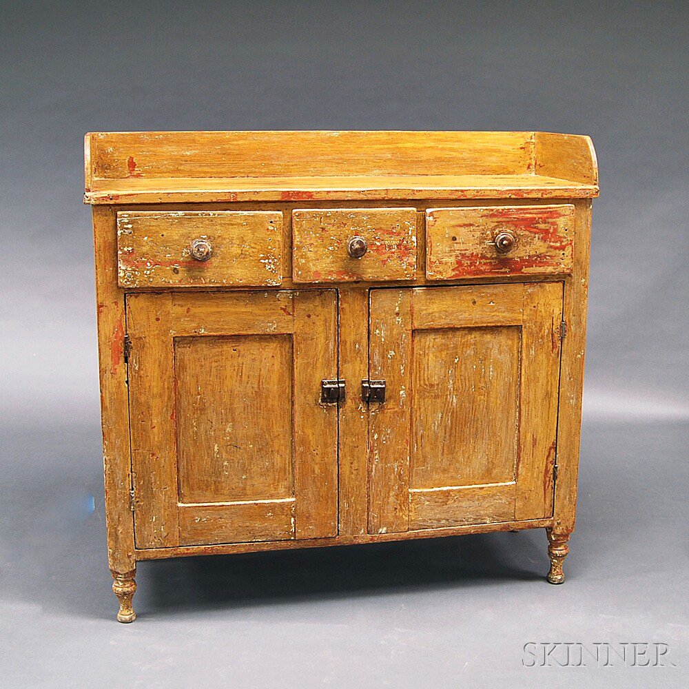 Appraisal: Country Yellow-painted Pine Cupboard th century the rectangular top with