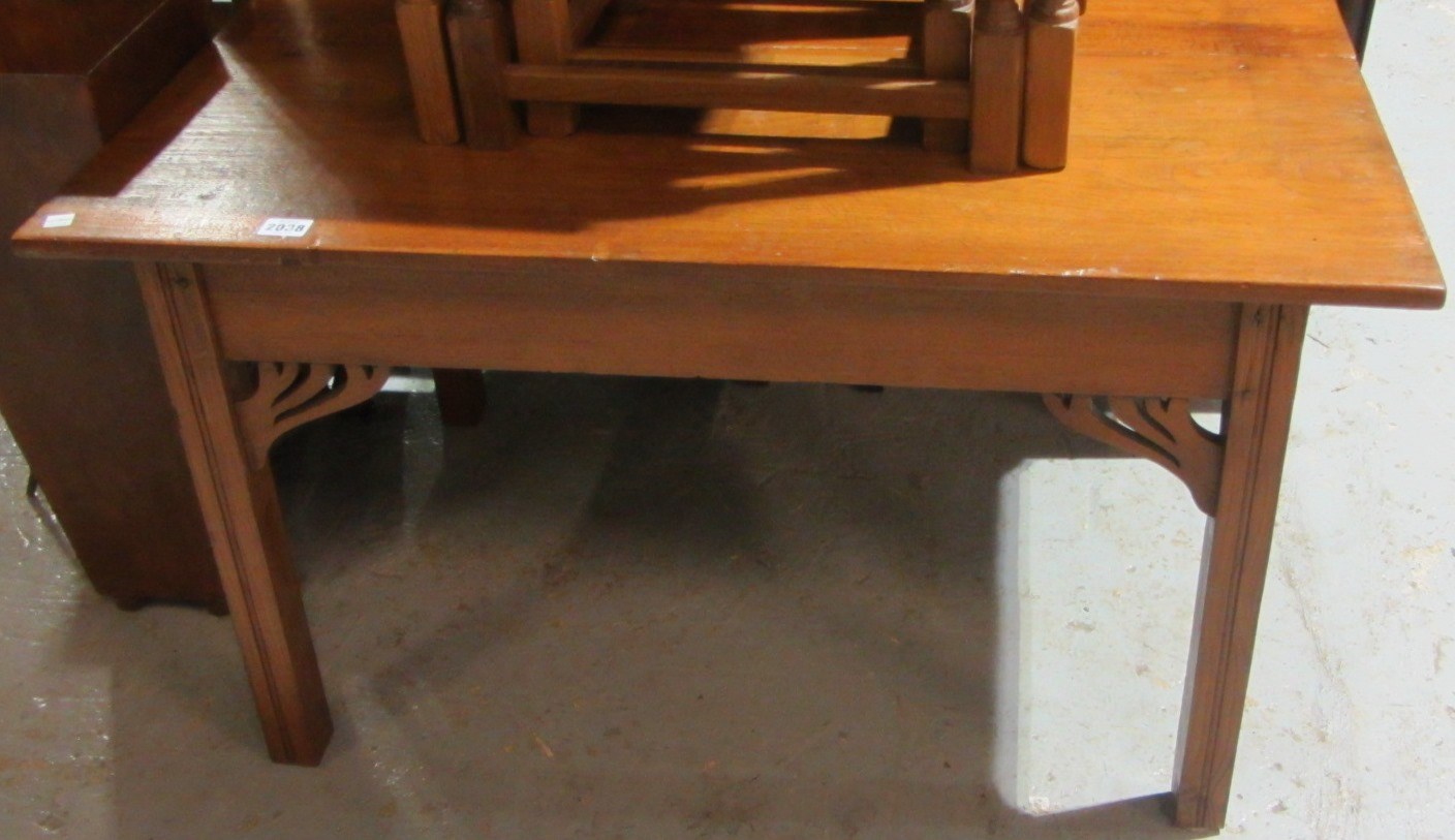 Appraisal: A stained pine rectangular table