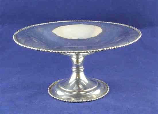 Appraisal: An Edwardian silver tazza with beaded border and engraved inscription