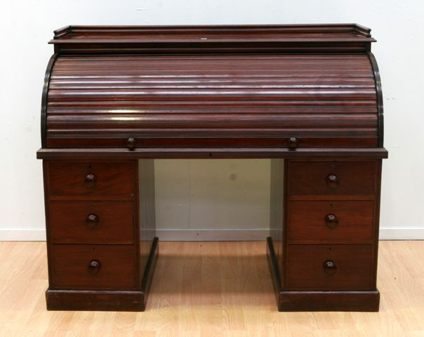 Appraisal: A Victorian mahogany roll top desk Note no keys available