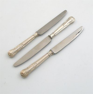 Appraisal: Twelve modern hourglass pattern table knives with stainless steel blades