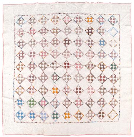 Appraisal: Hand stitched Nine Patch quilt geometric designs and printed fabrics