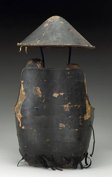 Appraisal: A lacquer jingasa Edo Period th Century With an hourglass-shaped