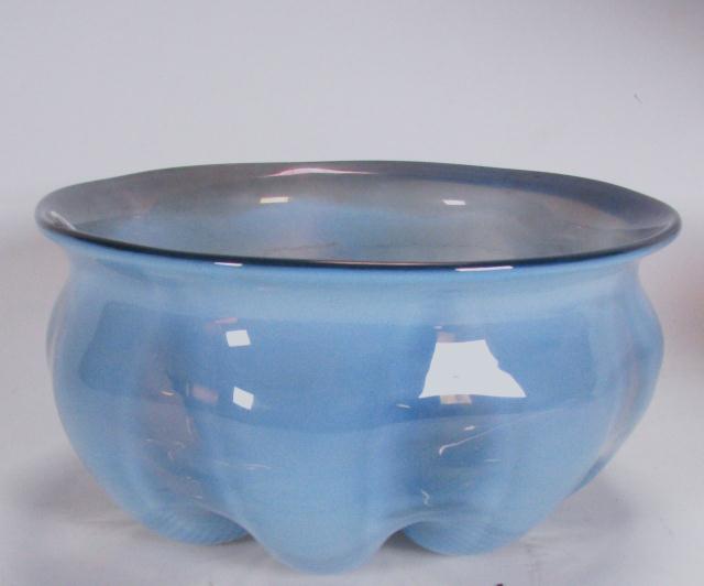 Appraisal: Opalescent blue art glass bowl '' diameter with ribbed design