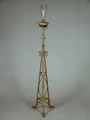 Appraisal: An early th century silvered adjustable wrought iron lamp base