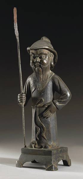 Appraisal: A bronze figure of a guardian Ming Dynasty Dressed in