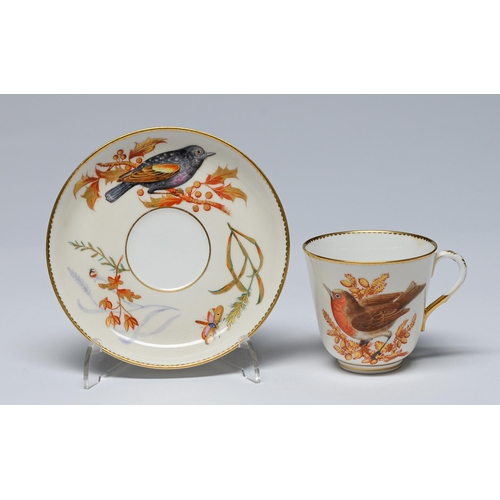 Appraisal: A Royal Worcester cup and saucer painted with birds and