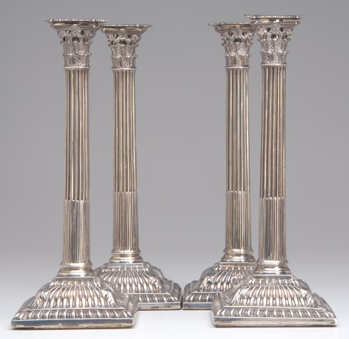 Appraisal: Two pairs of George III silver candlesticks each a Corinthian