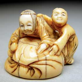 Appraisal: TWO ANTIQUE IVORY NETSUKE Two antique carved ivory netsuke two