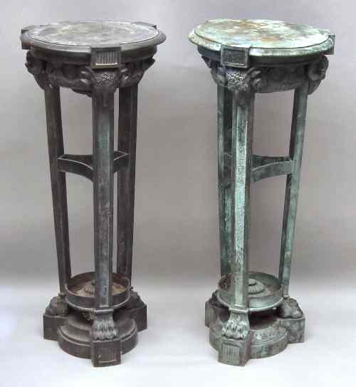 Appraisal: A pair of green patinated bronze circular jardiniere stands in