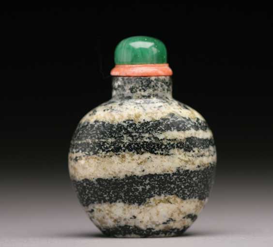 Appraisal: ANTIQUE BANDED SNUFF BOTTLE Finely hollowed and antique banded hardstone