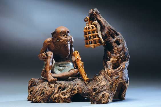 Appraisal: SHEKWAN POTTERY FIGURAL GROUP Highly amusing and well detailed Chinese