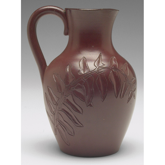 Appraisal: Rookwood handled vessel red clay body with deeply carved leaves