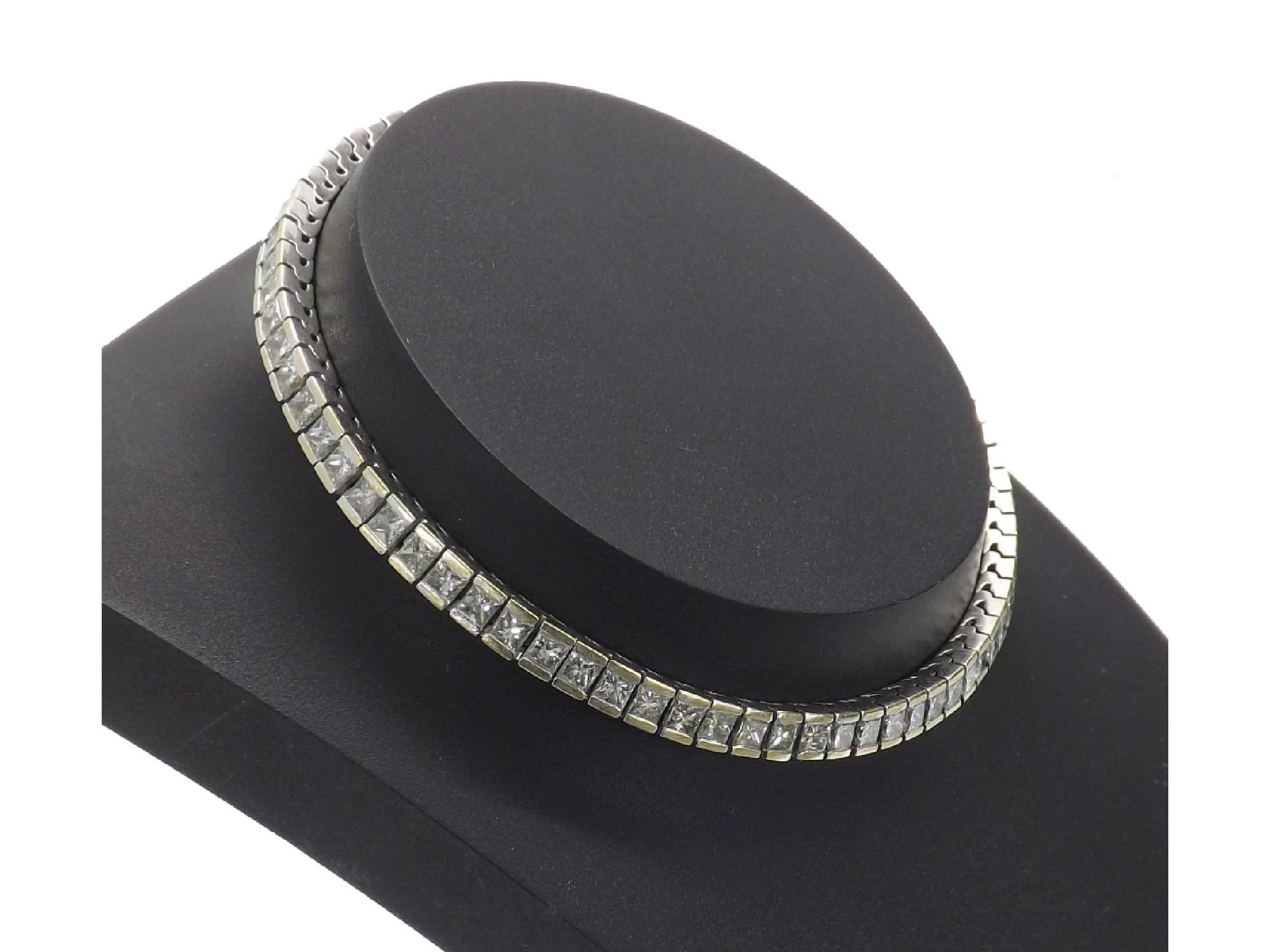 Appraisal: - -A ct white gold diamond line bracelet with approximately