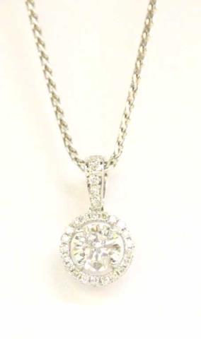 Appraisal: An K white gold halo pendant with ct round brilliant