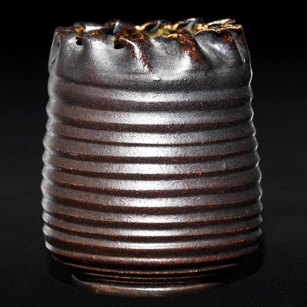 Appraisal: GEORGE OHR Ribbed vessel with folded rim covered in gun-metal