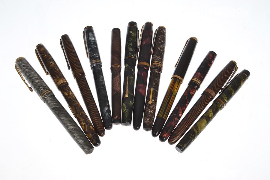 Appraisal: A COLLECTION OF TWELVE VINTAGE MARBLE FINISH FOUNTAIN PENS some