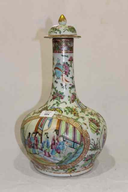 Appraisal: A CHINESE CANTON BOTTLE VASE and cover with interior scene