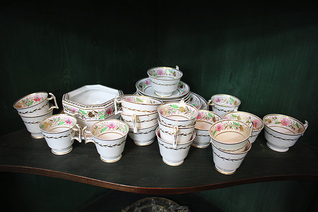 Appraisal: A SPODE PORCELAIN PART TEASET consisting of teacups coffee cups