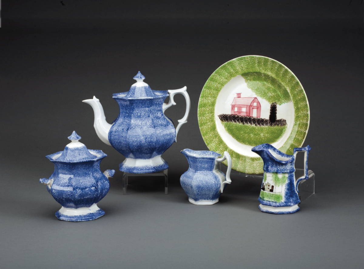 Appraisal: FOUR STAFFORDSHIRE BLUE SPATTERWARE TEAWARES COMPRISING A TEAPOT SUGAR BOWL