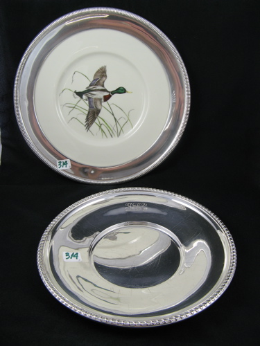 Appraisal: TWO STERLING SILVER PLATES One a hand colored scene of