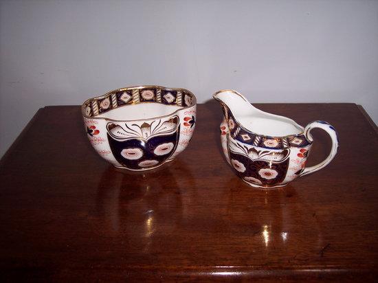 Appraisal: A late th Century Continental milk jug painted flowers in