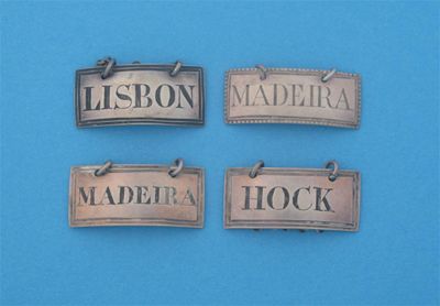 Appraisal: Four George III oblong labels a bead bordered 'MADEIRA' by