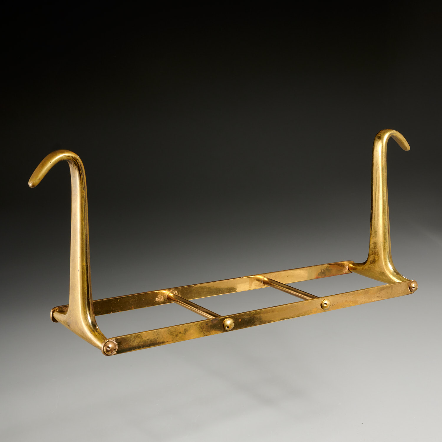 Appraisal: CARL AUBOCK BRONZE HANGING BOOK STAND c s the slat