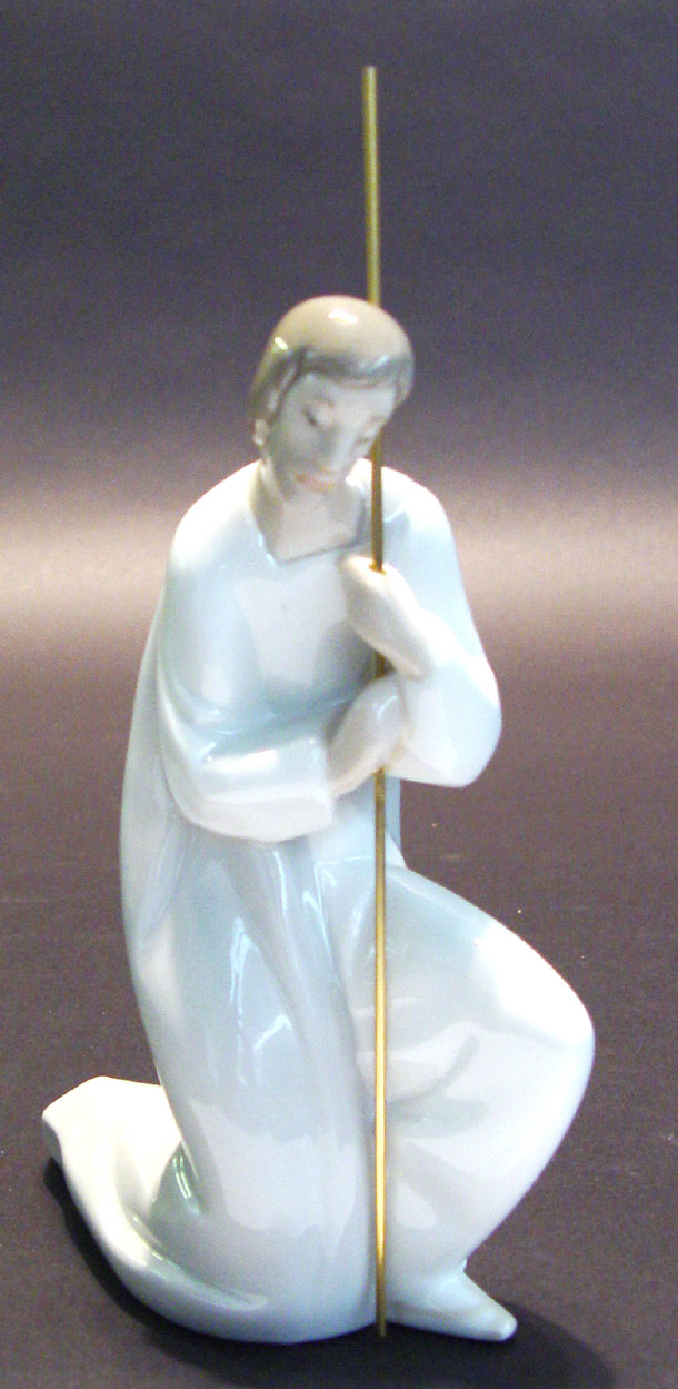 Appraisal: Lladro porcelain figure supported by a gold metal staff impressed