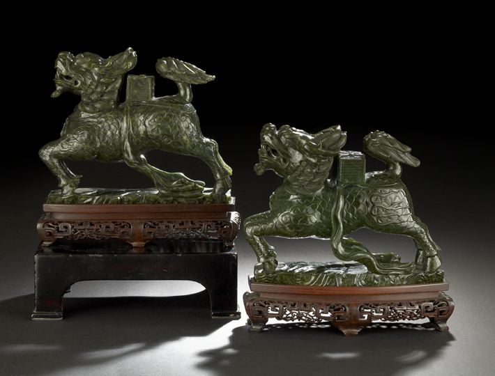 Appraisal: Pair of Chinese Carved Spinach Jade Figures of Kylin each