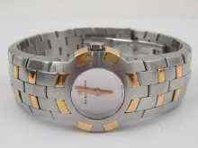 Appraisal: A stainless steal and yellow metal quartz lady's wrist watch