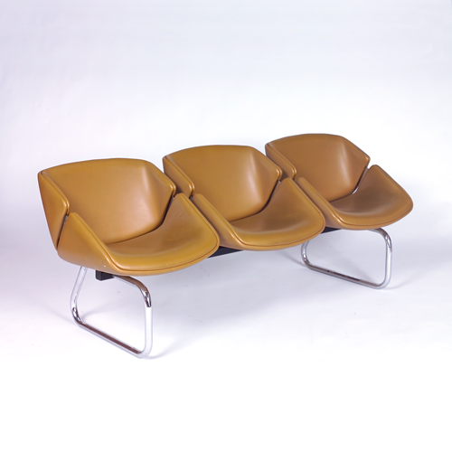 Appraisal: Thonet three-seat unit upholstered in caramel vinyl on polished and