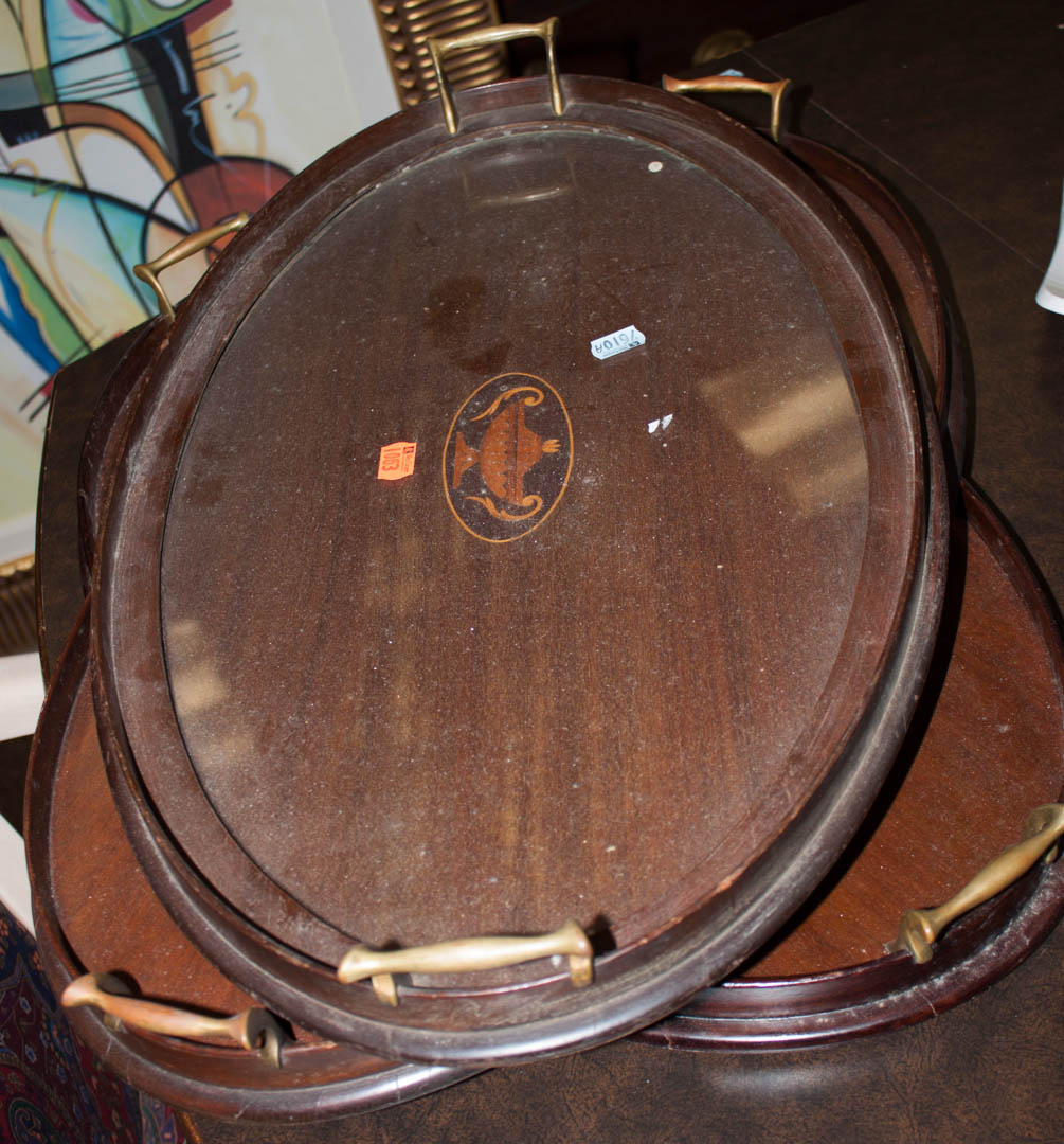 Appraisal: a Three Edwardian inlaid mahogany tea trays Condition Scratches and