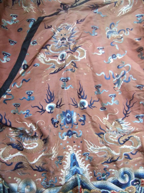 Appraisal: A Chinese brown silk informal robe late th century hand