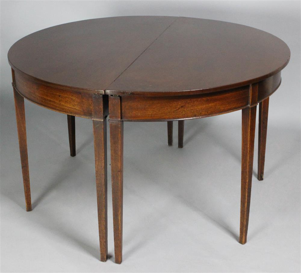 Appraisal: GEORGIAN MAHOGANY BANQUET TABLE WITH LEAF having two D ends