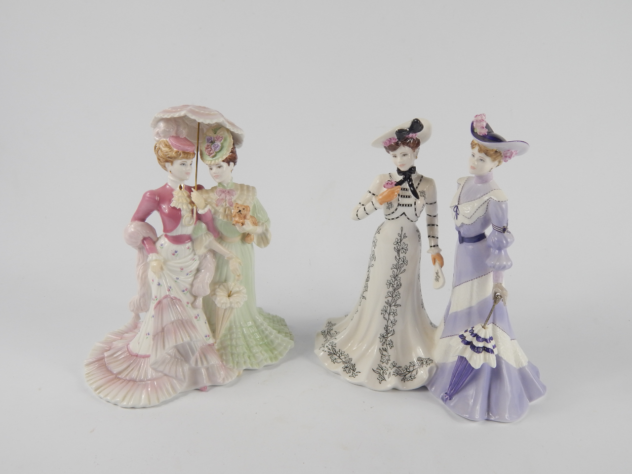 Appraisal: A Coalport Porcelain figure group At the Flower Show limited